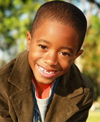 Boy showing his teeth