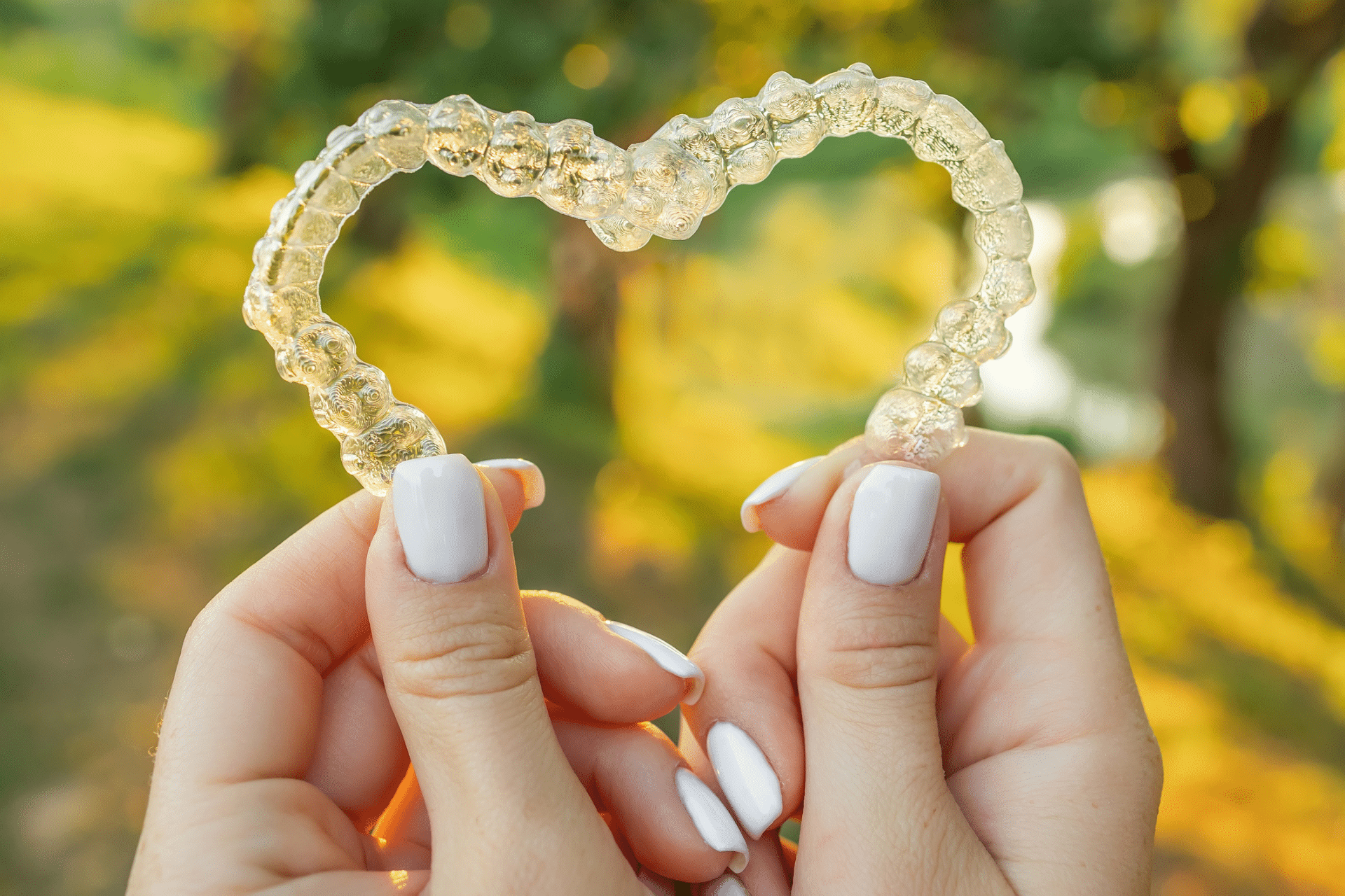 Clear aligner trays shown as a treatment option for complex orthodontic cases in Greensboro NC